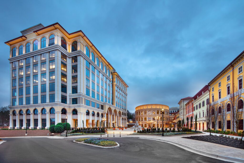 Modern office buildings with large windows and classic architectural details