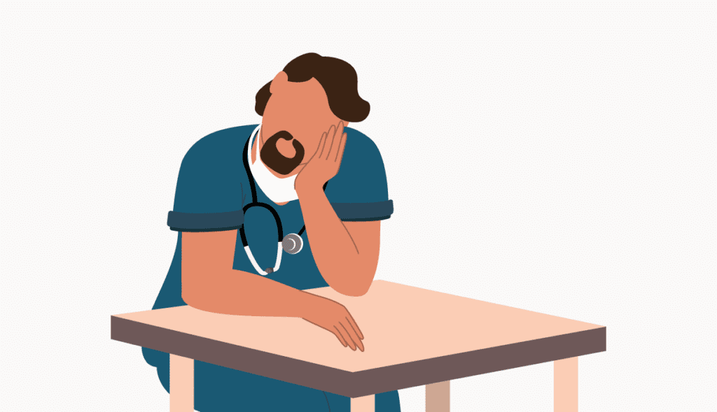 Illustration of a tired healthcare worker resting their head on their hand at a table