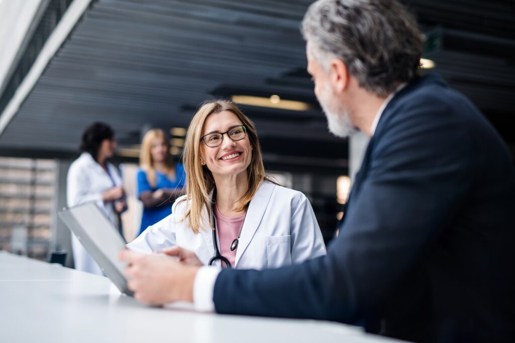 doctor and recruiter conversing