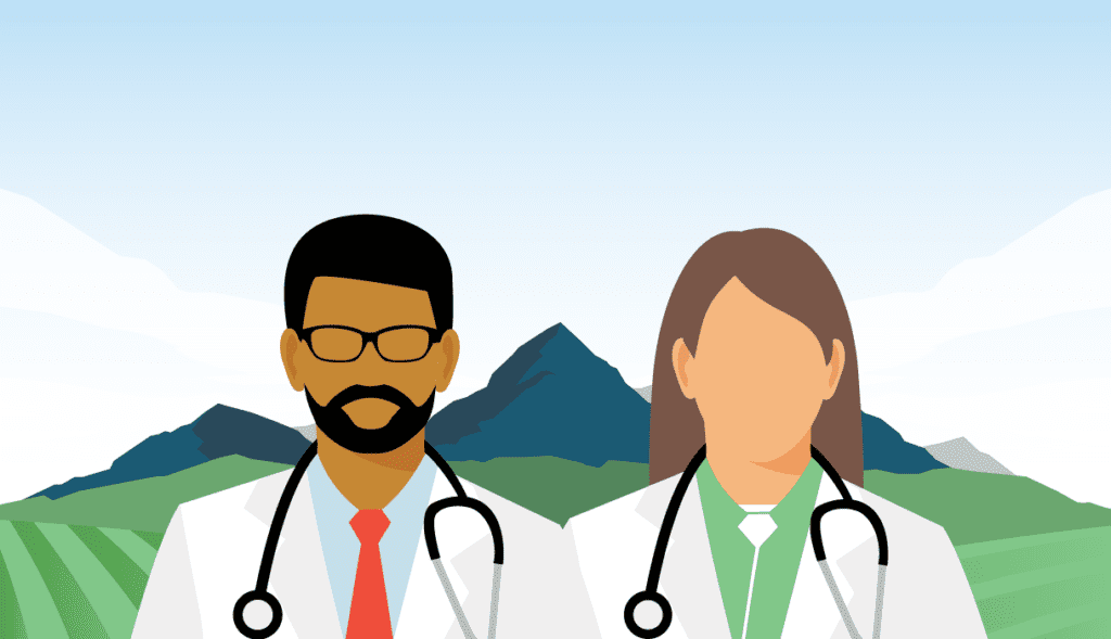 Two doctors standing in front of mountains in a rural area