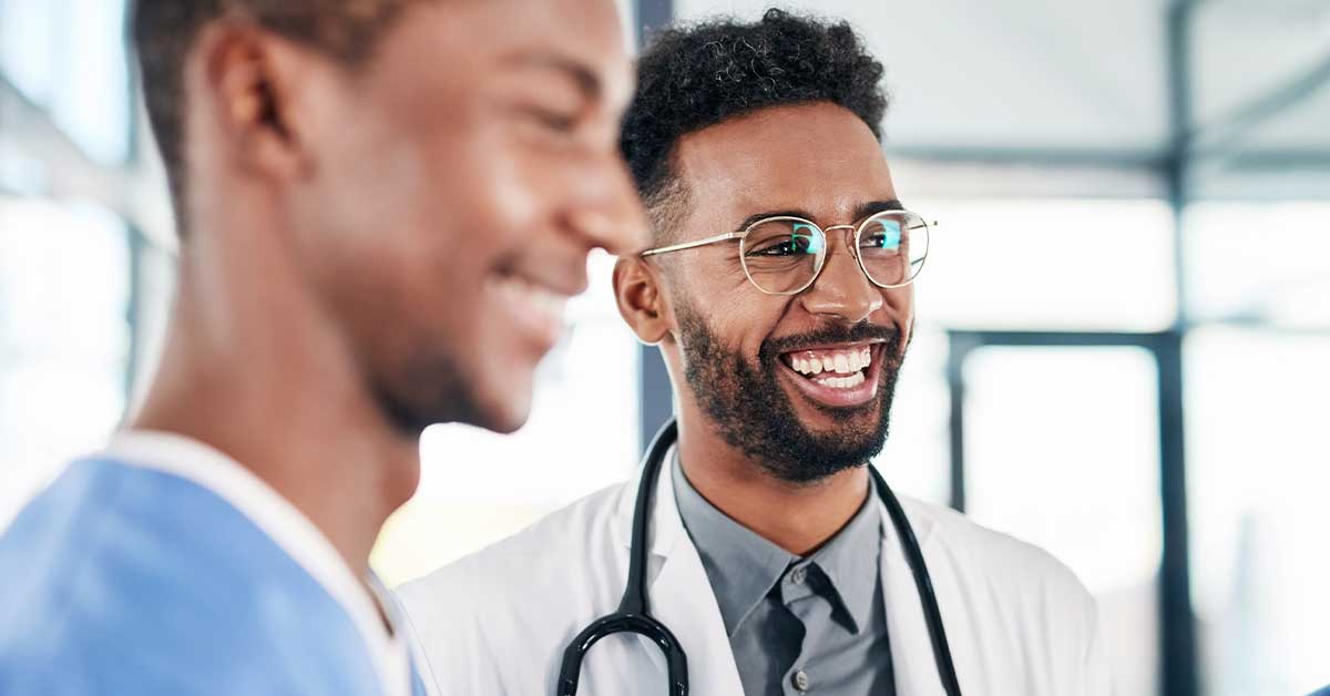 Black male physician happy at work